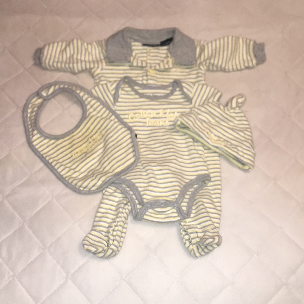 “Calvin Klein” four piece sleeper outfit. 0-3 mon.